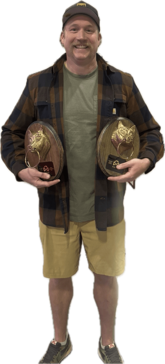 Bernie holding his two Golden Door awards